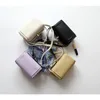 Kvällspåsar äkta läder liten låda för kvinnor 2023 lyxdesigner högkvalitativ kvinnlig axelväska damer plånböcker och handväskor gula