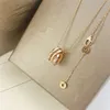 24ss Designer Fashion S Double Ring Full Half Diamond Bone Necklace for Women Plated with Rose Gold Tai Steel Personalized Spirit Snake Simp