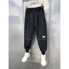 Calças masculinas casuais preto estiramento hip-hop harem na moda alfabeto streetwear roupas de marca de alta qualidade calças pantalones hombre