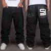 Jeans de diseño entero Hip Hop Hop Hop Streetwear Jeans Jeans Men sueltos para baile en la calle y apliques de patineta