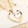 2023 Chaîne de pull longue de charme de qualité de luxe Collier pendentif avec un design en forme de coeur de grande taille en plaqué or 18 carats avec boîte à timbres PS4683A