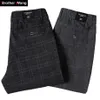 Nowe męskie patyki w kratę Business Casual Slim Fit ciemnoszary klasyczny styl elastyczne spodnie męskie ubrania marki 2102012822