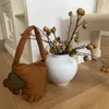 Axelväskor söta och minimalistiska blomma hinkväska bärbar väska kvinnors färg enkel axel färg bomullsäckväska trendystylishdesignerbags