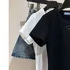 女性Tシャツファッショナブルでトレンディな丸い首のショート眠り新しいルーズフィッティングカジュアルな汎用カラーコットン454