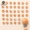 歯のおもちゃ100pcsを作るアバクスビーズベビー木製の天然レンズ豆のビーズビーチボールペルdiy歯が生えているネックレス看護玩具231016