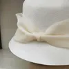 Berretti Cappelli da donna stile moda Cappello da pescatore Fedora in lana invernale con grande fiocco in stile bombetta a cloche Matrimonio elegante