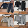 Kind Mode Kleidung Set Designer Kind Junge grau Sportkleidung Großhandel kleine Mädchen schwarze Kleidung 2 Stück Hoodies und Hosen