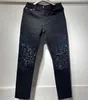 Designer para homens mulheres calças roxa marca jeans verão buraco 2023 novo estilo bordado auto cultivo e pés pequenos moda