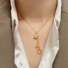 Collier trèfle à quatre feuilles, chaîne de trèfle à quatre feuilles, serrure à timbre, bijoux en acier titane de styliste pour femmes