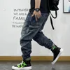 Мужские джинсы Американская мода Хип-хоп Карго Уличная одежда Скейтборд Шаровары Мужская одежда Японский Harajuku Джинсовые повседневные брюки Мужской 231016