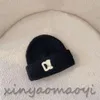 مصمم الصوف المحبوب قبعة شتاء دافئ قبعة قبعة قبعة مان للنساء القبعات 7 ألوان