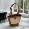 Shoulder Bags 2023 design straw woven portable bucket bag for women's splicing single shoulder underarm bagstylisheendibags