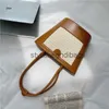 Shoulder Bags 2023 design straw woven portable bucket bag for women's splicing single shoulder underarm bagstylisheendibags