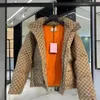 Mens Down Jacka Parka 여성 검은 복어 재킷 후드 프리미엄 캐주얼 야외 겨울 따뜻한 따뜻한 지퍼 브라운 디자이너 코트 남성 커플 조인트 재킷