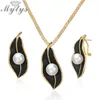 Mytys Pearls Necklace On Black Leaf Jewelry Sets For Women Retro Romantic Gold Wire Frames Leaf Pendant Earrings CE611CN540250e