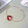 Pulsera de cinco flores con diseño de mariquita de la suerte y oro chapado en plata de ley de Seven Star