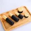 Black Frosted Glass Cream Bottle Cosmetic Lotion Spray Bottles Empty Refillable Jars with Wood Grain Plastic Lids Erhlo