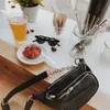 Sac de taille s sac ceinture pur cuir PU noir chaîne en métal somme par bande Fanny Pack Bananka mode sauvage sacoche ventre 231013