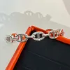 Nouveau bracelet amoureux lisse et minimaliste évidé nez de cochon ovale avec ouverture S925 argent haut de gamme polyvalent