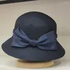 Berretti Cappelli da donna stile moda Cappello da pescatore Fedora in lana invernale con grande fiocco in stile bombetta a cloche Matrimonio elegante