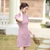 Kjolar våren och sommaren polyester korta rutiga cheongsam spets mode förbättras girly