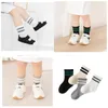 Barnstrumpor 4Pairs Kids Sport Socks Barnens solida färgstrumpor Boy White Black Student Socks Baby Girl Middle Tube Cotton Toddler Socks 231016