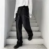 Pantaloni da uomo Design con cerniera dritta Pantaloni casual slim a vita media alla moda Chic Performance sul palco in bianco e nero