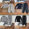 Kind Mode Kleidung Set Designer Kind Junge grau Sportkleidung Großhandel kleine Mädchen schwarze Kleidung 2 Stück Hoodies und Hosen