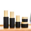 Black Frosted Glass Cream Bottle Cosmetic Lotion Spray Bottles Empty Refillable Jars with Wood Grain Plastic Lids Erhlo