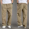 Mäns byxor 2023 Mens Casual Cargo Cotton Men Pocket Loose Straight Elastic Work Trousers Brand Fit joggar manlig överdimensionerad