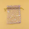 Pochettes à bijoux 200 pièces/lot, sacs en Organza à motif d'étoile et de lune de couleur violette, sac cadeau pour cadeaux de mariage, 7x9cm