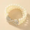 Nowa barokowa imitacja imitacja Pearl Bransoletka Metal Gold Bow Rhinestone Bracelets For Women Party Jewelry Akcesoria1286i