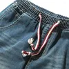 Heren jeans streetwear denim stretch elastische taille heren blauwe cargo harem mannelijk plus maat 5xl joggers koreaanse volledige lengte broek