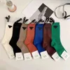 Skarpetki Projektant Zorientu Zima Zimowa Premium Znak Zagroda Czarna Trójkąt Trójkąt Ins Socks Średnie rękaw stałe kolory skórzane kobiety wicp