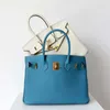 Autumn Handbag Tote Blue Top Layer Cowhide Litchi Mönster Kvinnor One Shoulder Crossbody stor kapacitet med logotyp