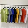 23SS 8 colori Abbigliamento firmato Magliette CP Magliette da uomo di alta qualità Camicie da donna casual T-shirt hip-hop Manica corta Coppie Polo con distintivo T-shirt moda asiatica M-XXL