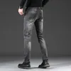 Мужские джинсы дизайнерские весенние хлопковые пули Корейская версия Slim Fit Small Feet Дымчато-серый Высококачественные европейские товары Big Bull 8V9A