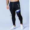 Pantalons hommes Hommes Joggers pantalons de survêtement Hip Hop mode mâle pantalons serrés hommes gymnases Fitness homme pantalon coton mince pantalon musculation hommes x1017