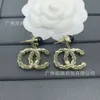 Boucles d'oreilles de bijoux de créateur