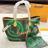 Luxurys Designer Femmes Accessoires Graffiti Sac fourre-tout France Marque L Jamais et monogrammes complets Modèle en cuir Shopping Sacs à main Lady Sacs à bandoulière avec pochette MM Taille