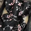 Printemps et automne édition coréenne luxe léger tempérament de célébrité à manches longues col rond taille mince mi-longue robe trapèze en maille brodée