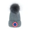 Automne Canada Bonnet tricoté Bonnet de luxe hiver Hommes et femmes Unisexe Lettre brodée logo laine d'oie chapeaux mélangés E-4