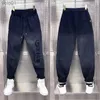 Jeans sarouel ample pour hommes, pantalon décontracté de rue avec lettres imprimées, populaire de haute qualité, vêtements de marque L231017