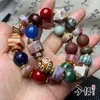 Strand Old Agate Double-Head TripoD Duobao Tibet pärlor mäns och kvinnors vita qin åttkantiga armband