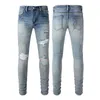 Mens jeans mode långa mager smala jeans berömda varumärke Hip Hop Designer Jeans denim Pant Estruerad Ripped Biker Jean Black Blue Letter Printed Pants Size S-XL