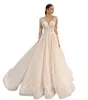 Dubai Crystal A Line Wedding Dresses 2023 spets långärmad plus storlek brudklänningar ren långärmare spetsfjädrar lyxiga vestido de novia arabiska strand boho ons klänningar