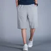 Pantaloncini da uomo Arrivo Moda Estate Sottile Allentato Grandi Uomini Casual Cotone Lino Elastico in vita Lunghezza al ginocchio Plus Size XL 2XL3XL 4XL