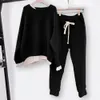 Mulheres Tracksuits Moda Mulheres Dois Papel Split Joint Loose Sweater Tracksuit Design Two-Peça Estilo Outfit Suéter Calças Conjuntos S-XXL 231016