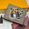 Designers Men Animal Fashion Short Wallet Leather Black Snake Tiger Bee Women Luxury Purse Card Holders With Gift Box Top Quality AA luxurybags886
