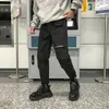 Herrbyxor mode män streetwear lastbyxor herr byxor hip hop joggers fickor lila män kvinna tröjor koreanska fotledslängd byxor 231017